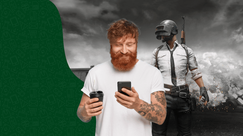A man in a white shirt in front of a battlefield of the game pubg