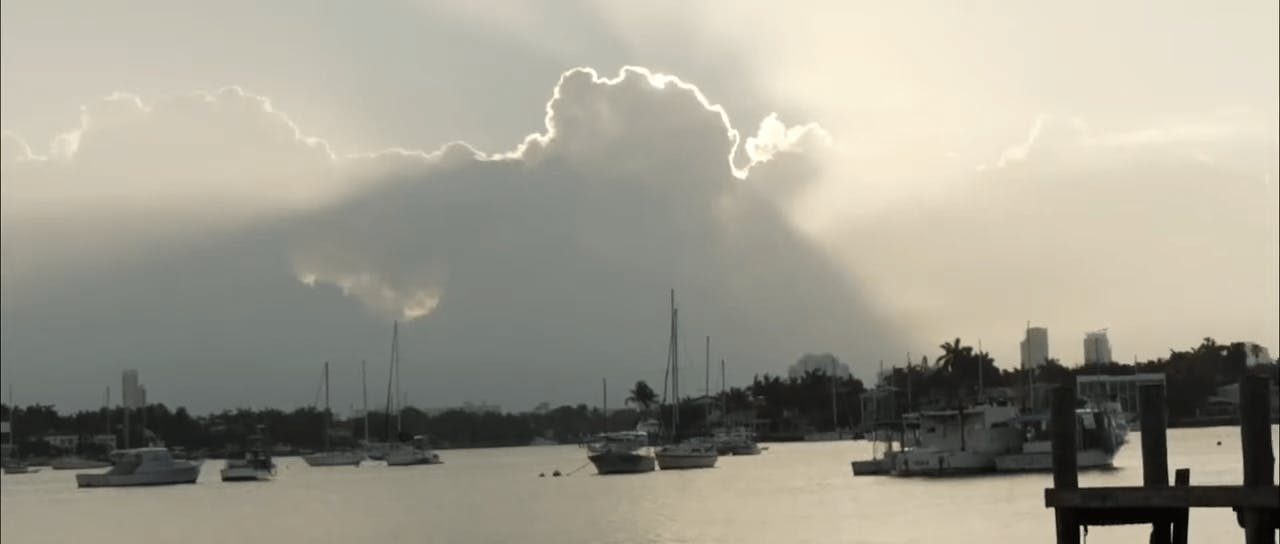 Cloudy sky over a marina