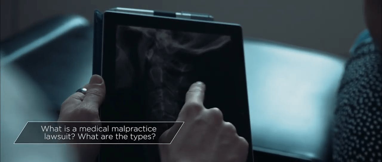 Doctor looking at X-ray