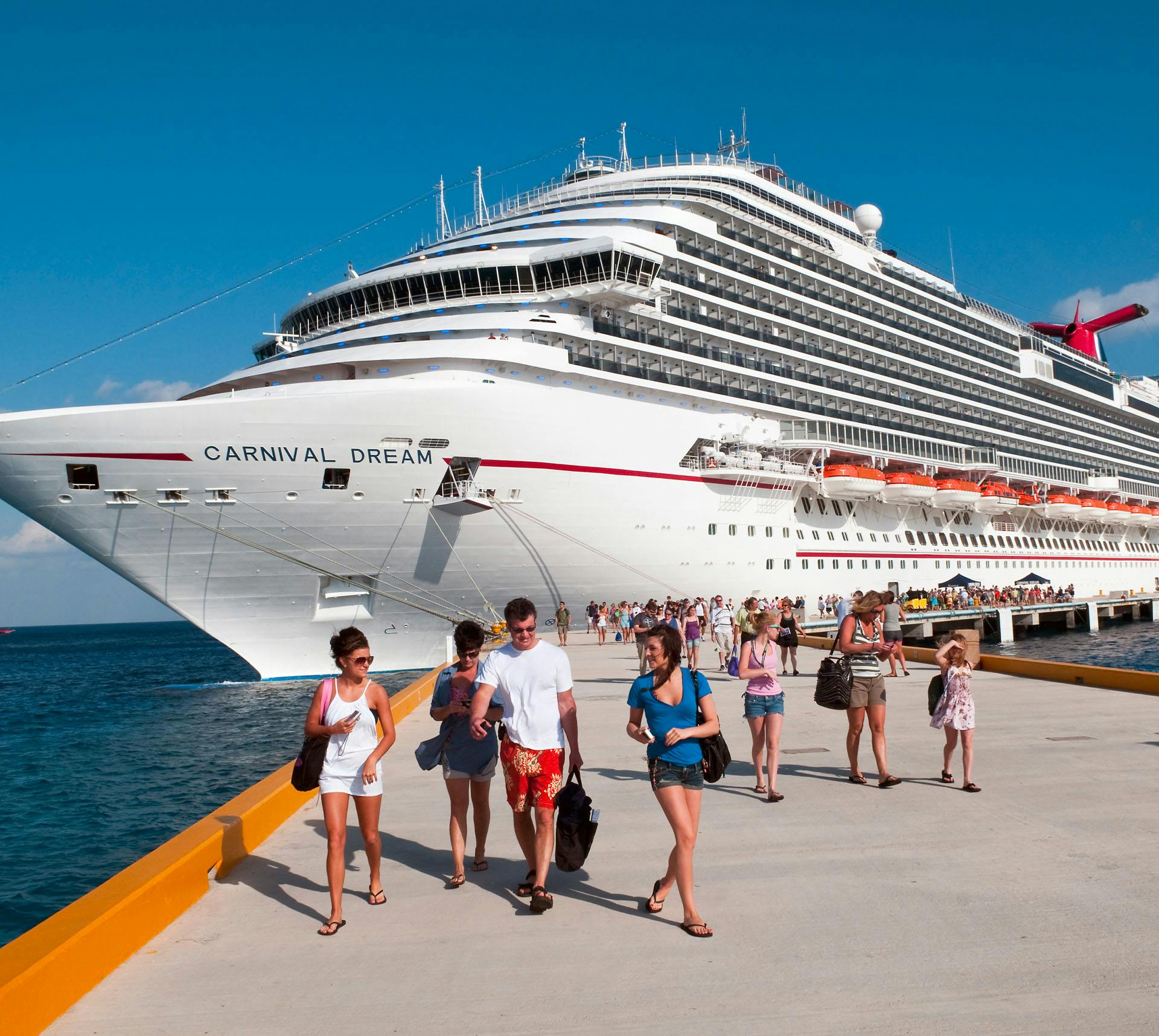 People leaving a cruise ship