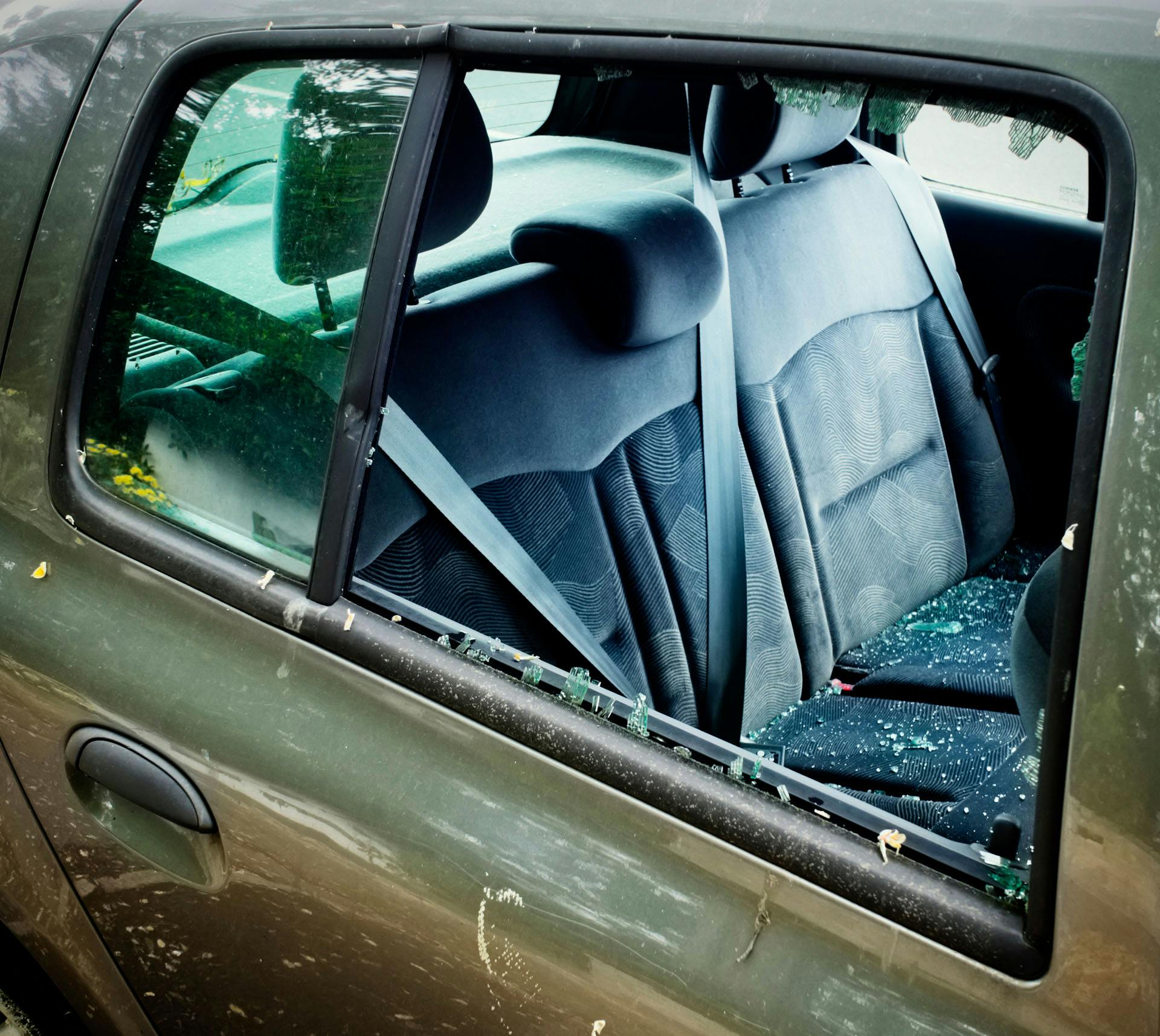 Car with backseat window shattered
