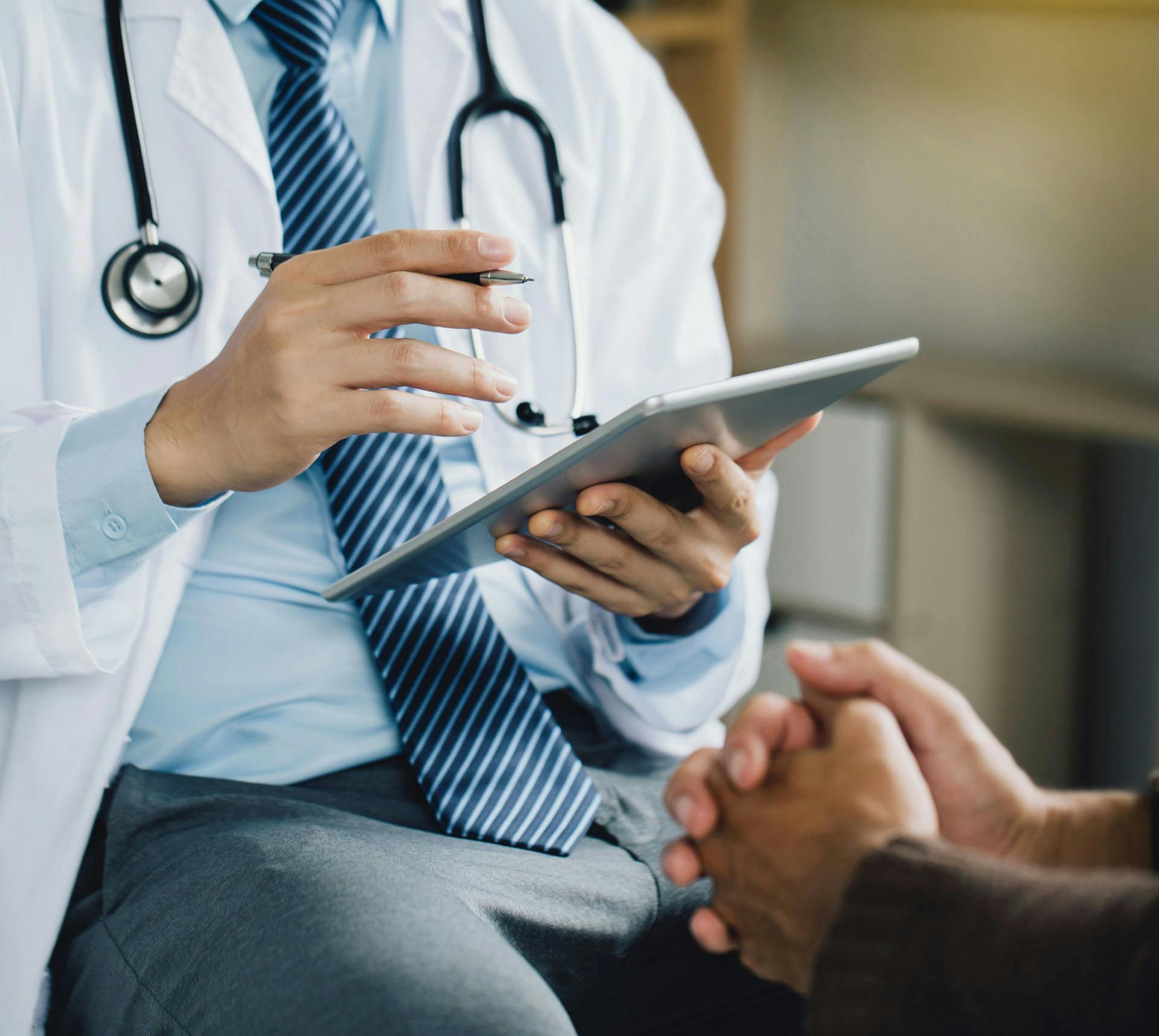 Doctor speaking to patient