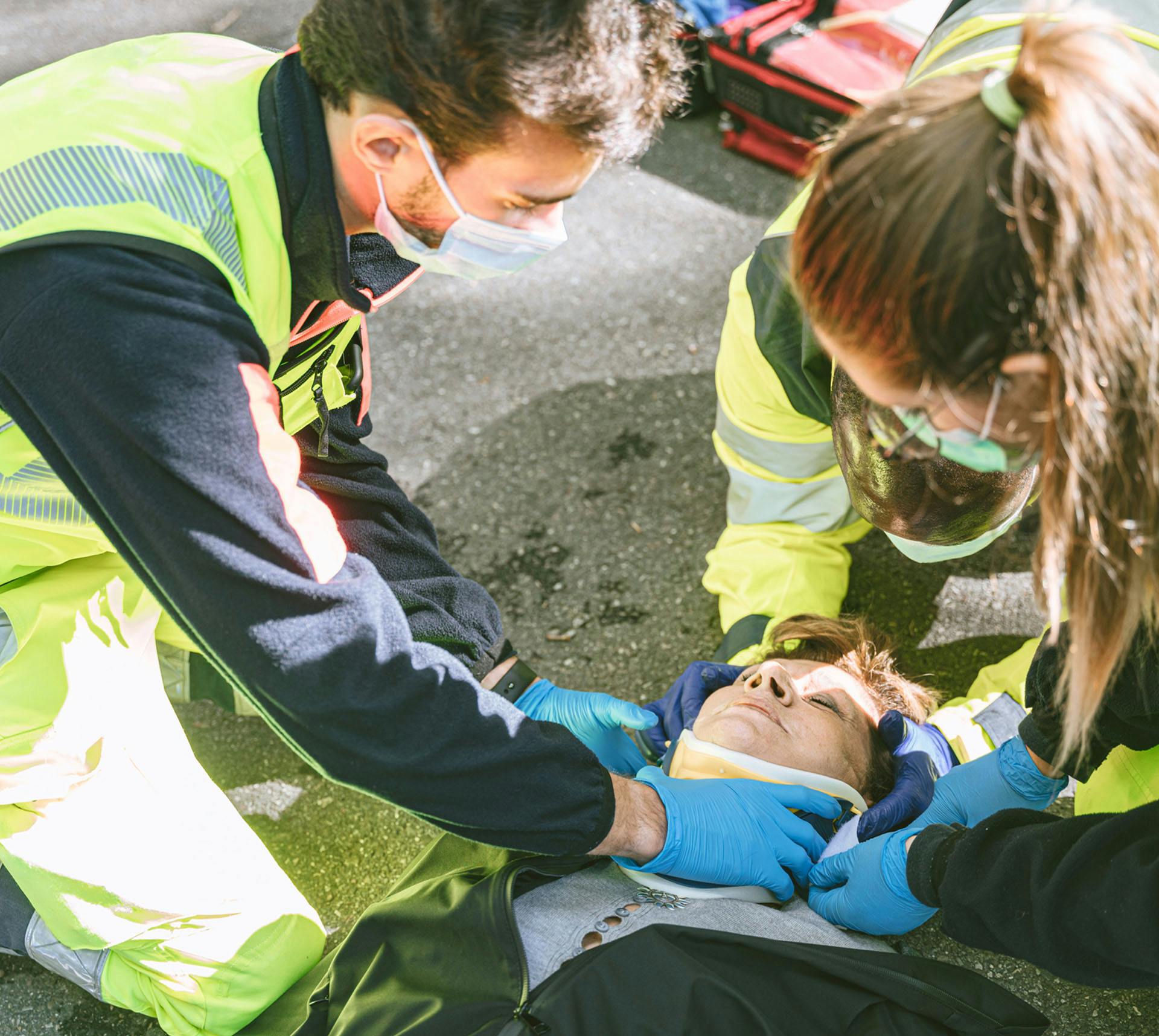 First responders helping injured woman