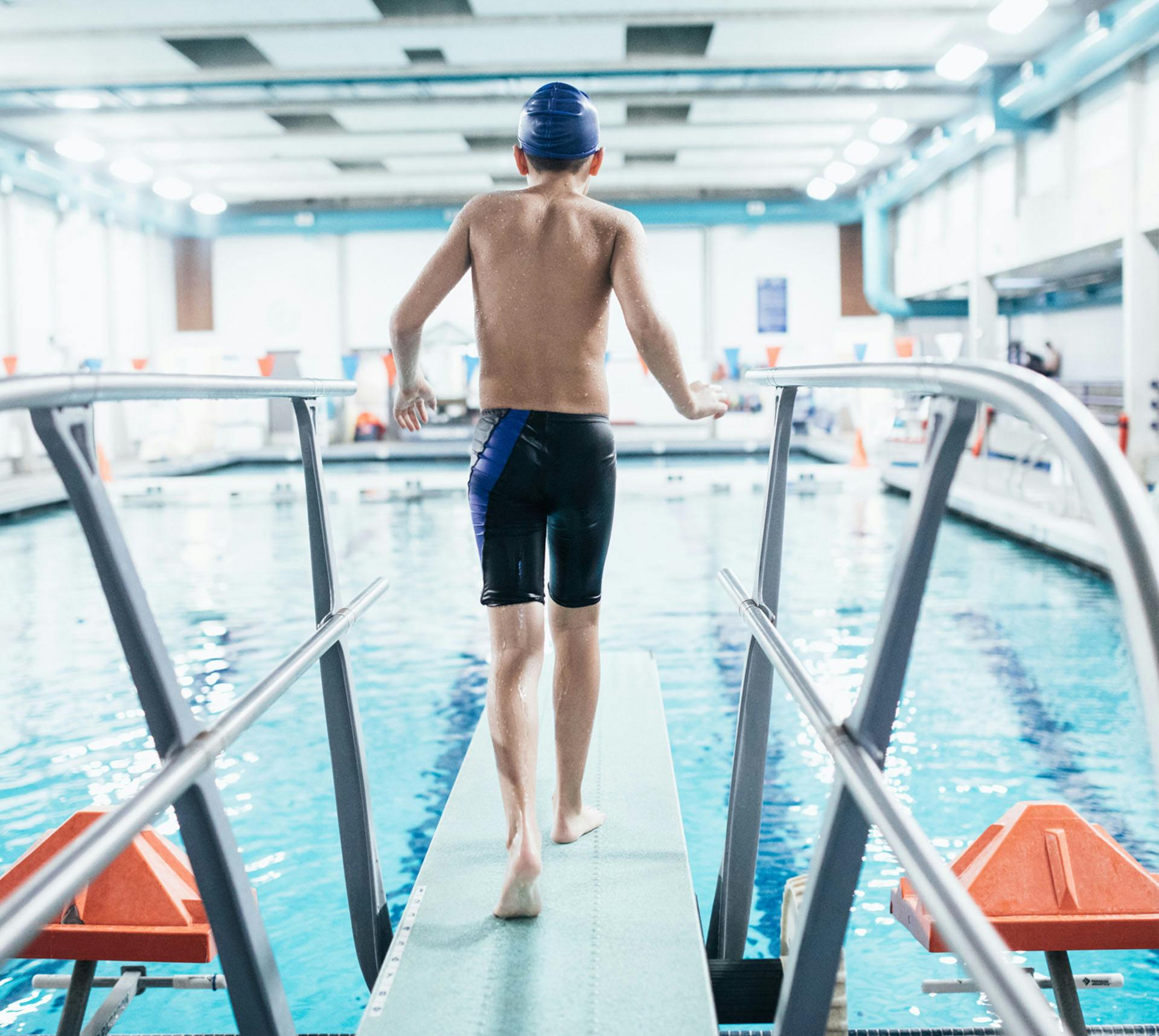 Boy on diving board