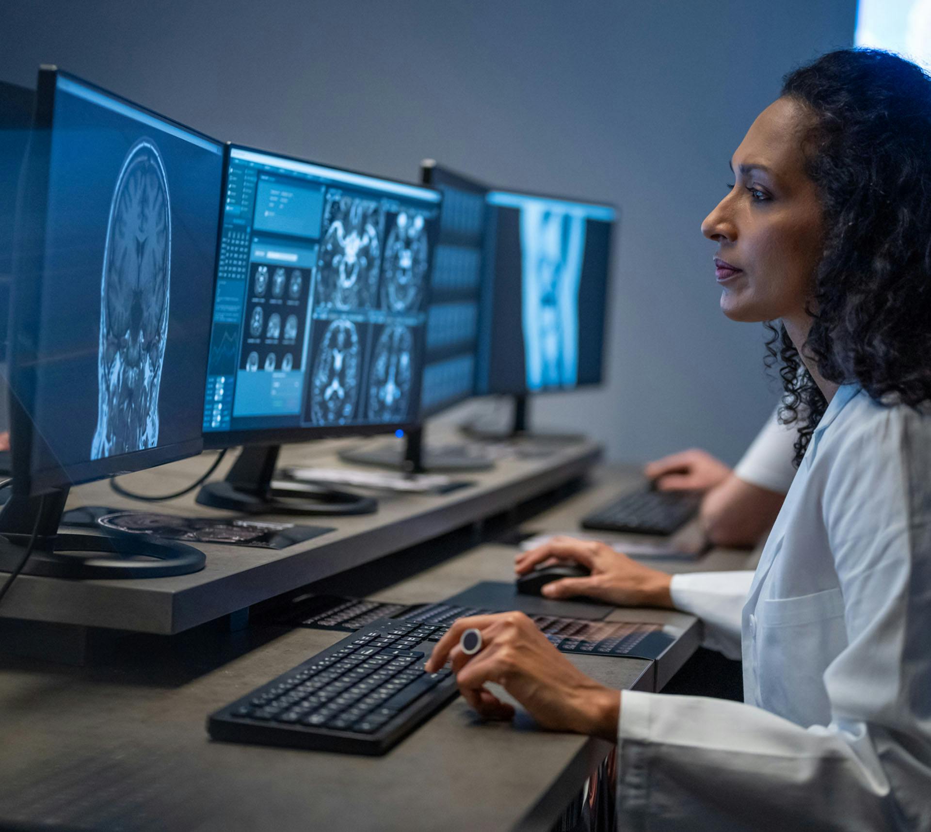 Doctor looking at photos of head scan