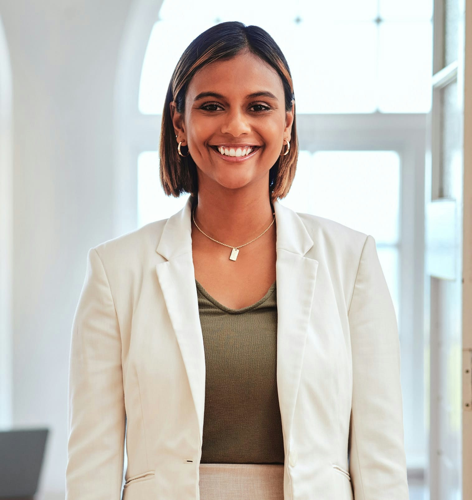woman wearing doctor's blazer