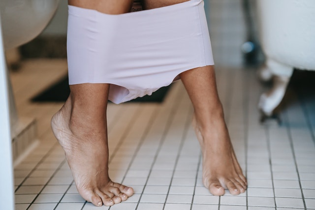 Woman going to the bathroom