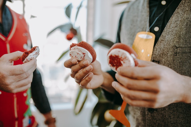 two people eating cookies