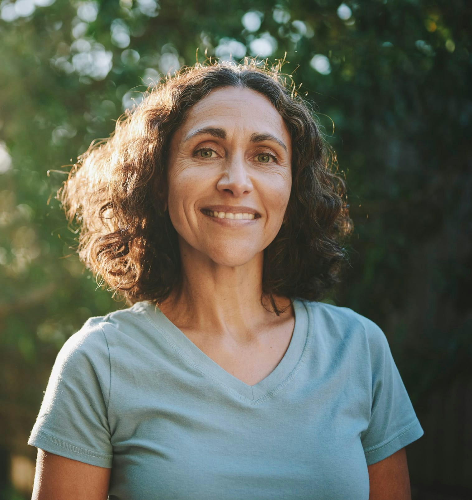 Woman in blue shirt outside