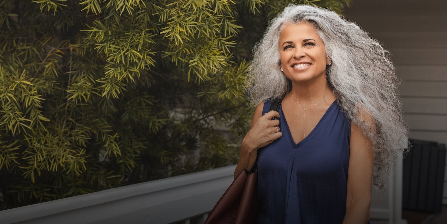 Woman with wavy grey hair