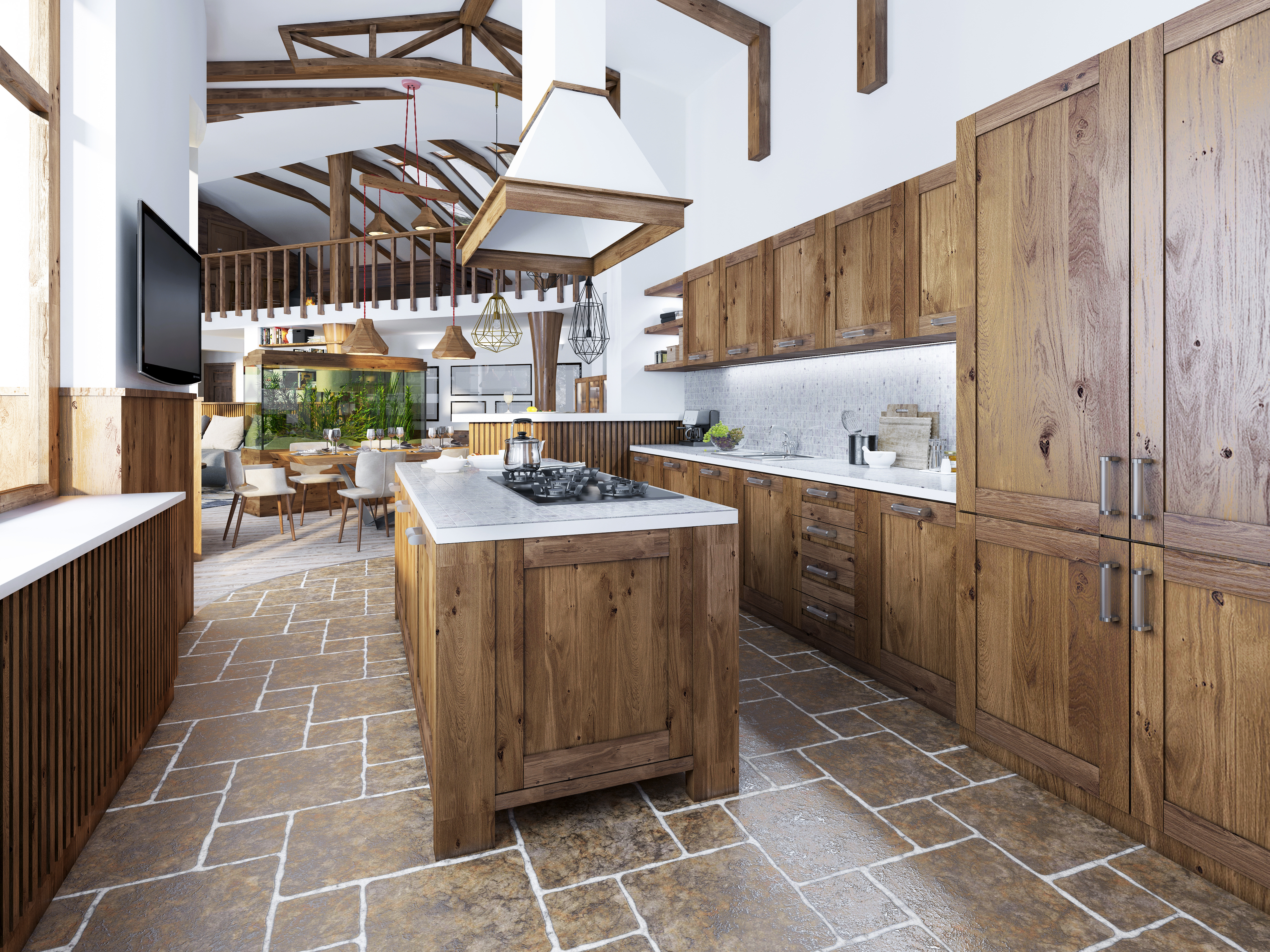 The large kitchen in the loft style with island. Wooden furniture with white worktops and mosaic with integrated appliances.
