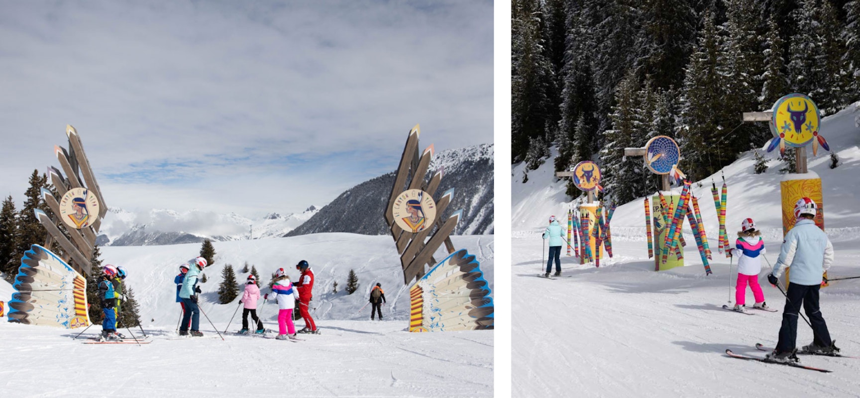 Children are learning to ski on a snowy mountain slope. Adults guide them, and colorful decorations line the path, with pine trees all around.