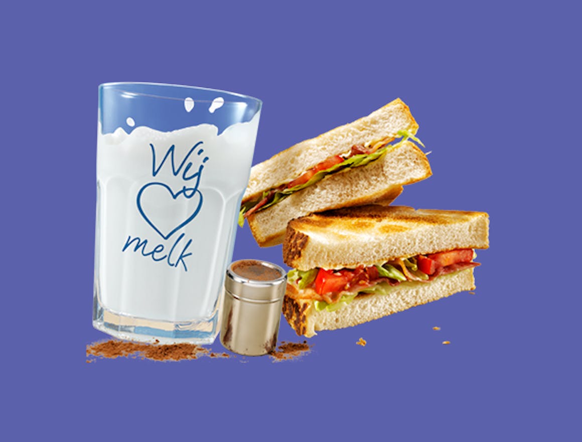 Melkunie volle melk met een sandwich.