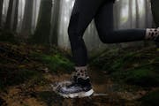 Close-up of a shoe crossing a stream