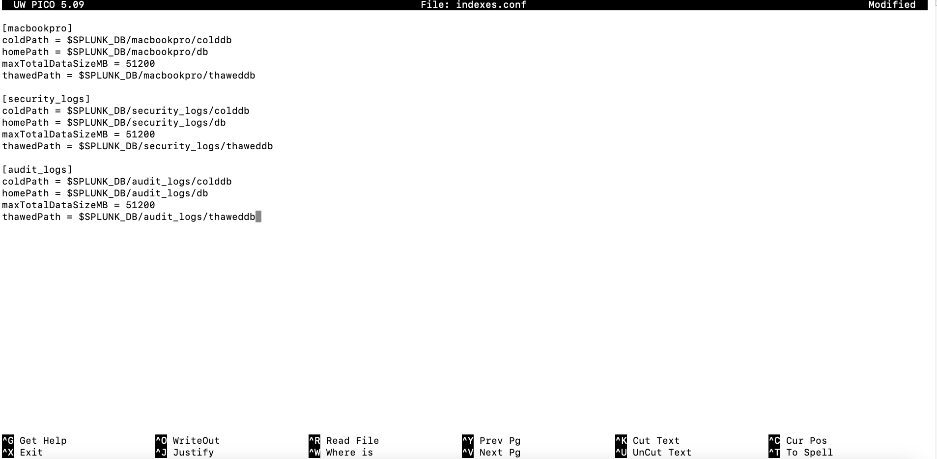 The image displays the Nano editor interface with the 'indexes.conf' file open, showing configurations for the 'macbookpro', 'security_logs', and 'audit_logs' databases in Splunk.