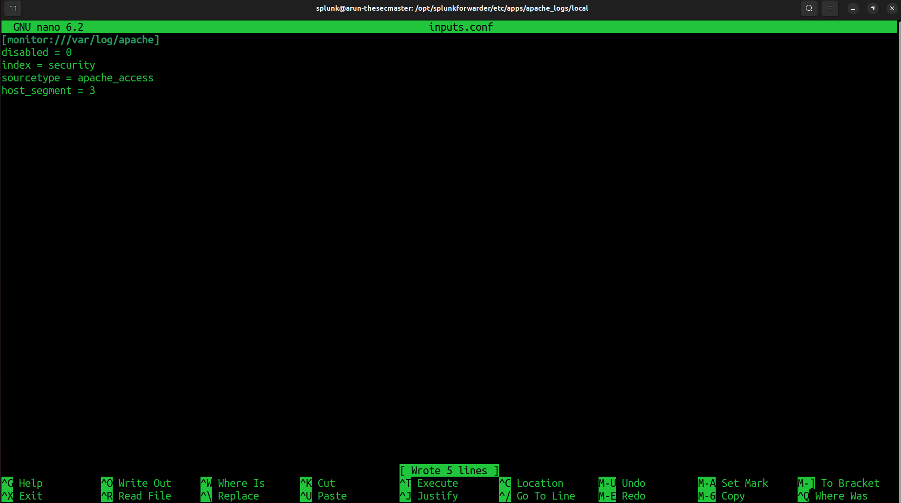 Screenshot of the GNU Nano editor open on a Linux terminal, displaying the configuration of the inputs.conf file for monitoring Apache logs in Splunk.