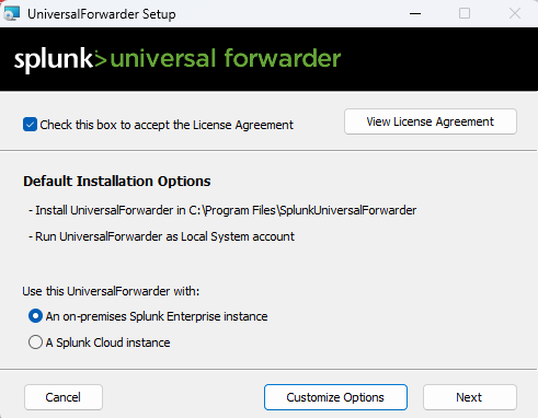 Setup window of the Splunk Universal Forwarder showing default installation options and licensing details.