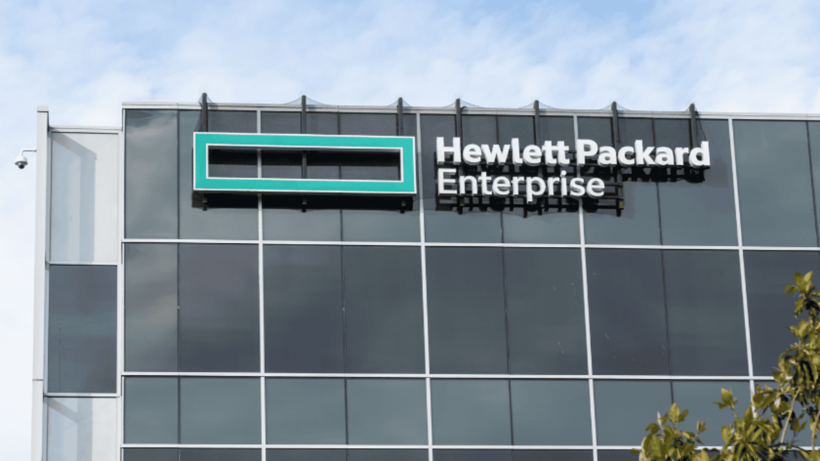 Hewlett Packard Enterprise logo on the exterior of a modern office building.