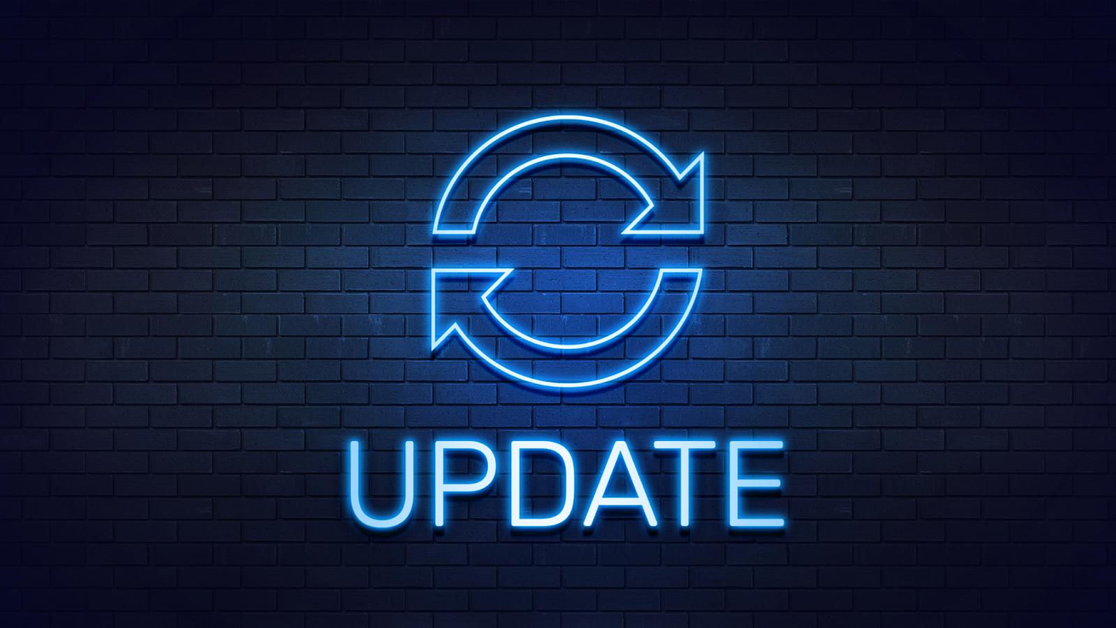 A neon-style update icon with the word "UPDATE" glowing against a dark brick wall background.