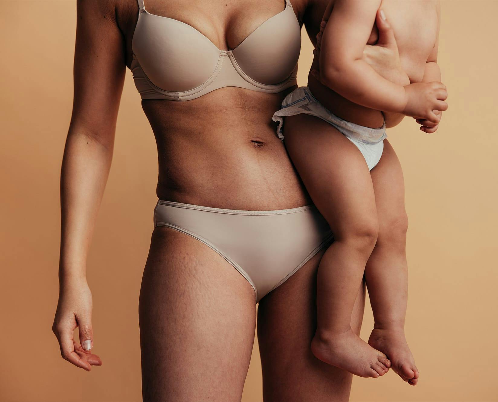 woman holding a toddler