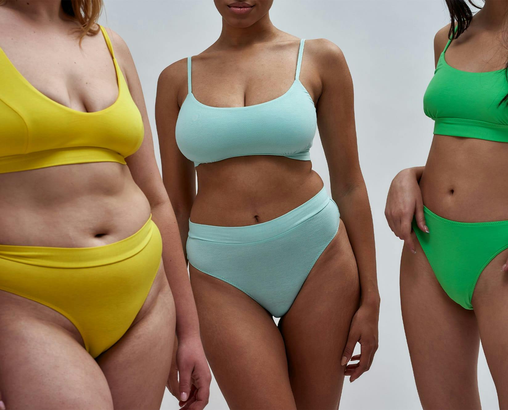 3 women in different color bikinis, 3 different sizes