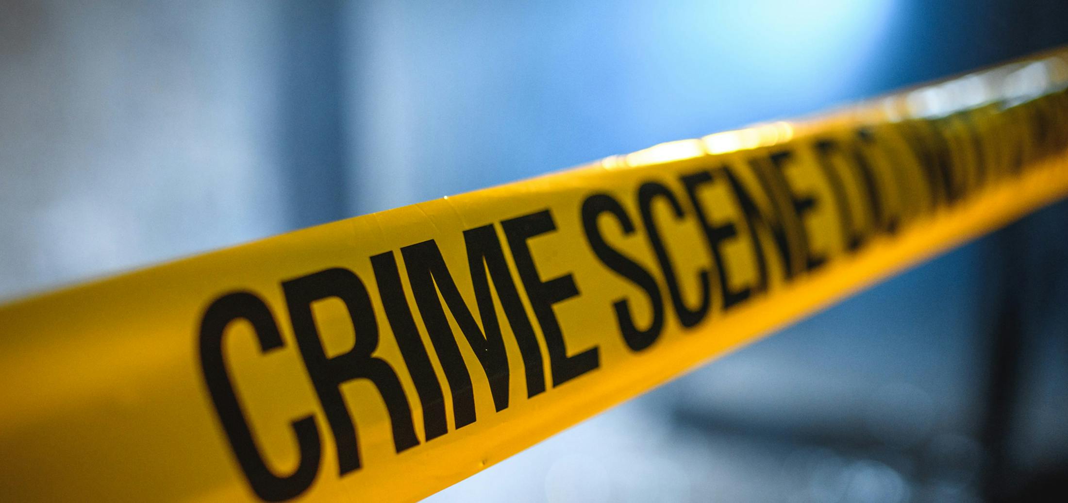 Felony Charges Banner - Yellow Tape with Crime Scene Written on it