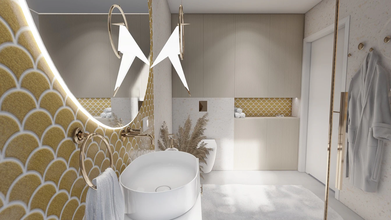 Złoty uchwyt na ręcznik obok nablatowej umywalki. Okrągłe lustro podświetlone od spodu ledami, które dodają nastroju i  rozproszonego, delikatnego światła.