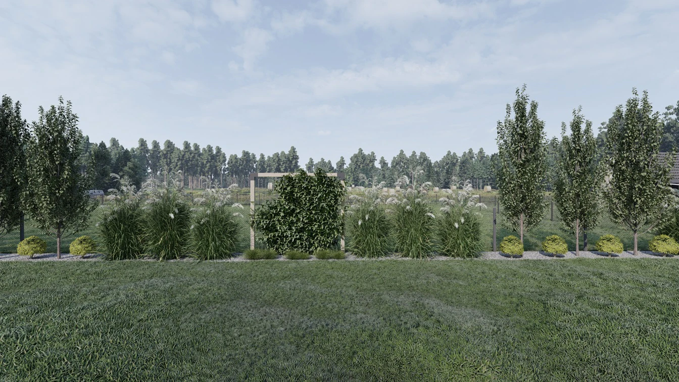 Soczysta zieleń na rabacie w postaci gatunków drzew, traw oraz pnączy.