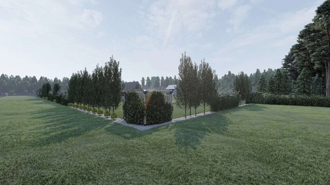 Długa rabata z nasadzeniami drzew, bylin, traw ozdobnych oraz pnączy.