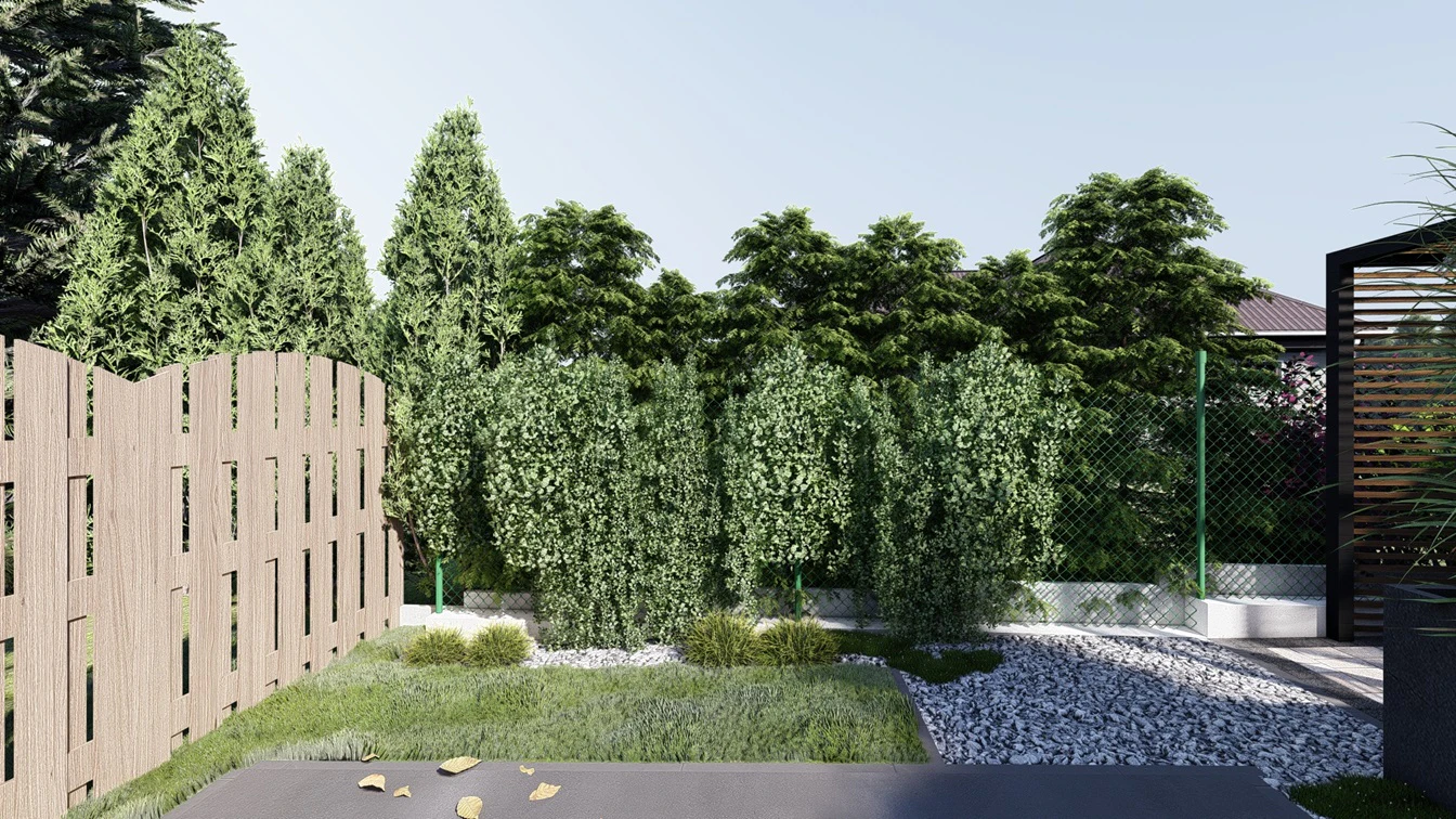 Minimalistyczna rabata przy siatce graniczącej z sąsiadem.