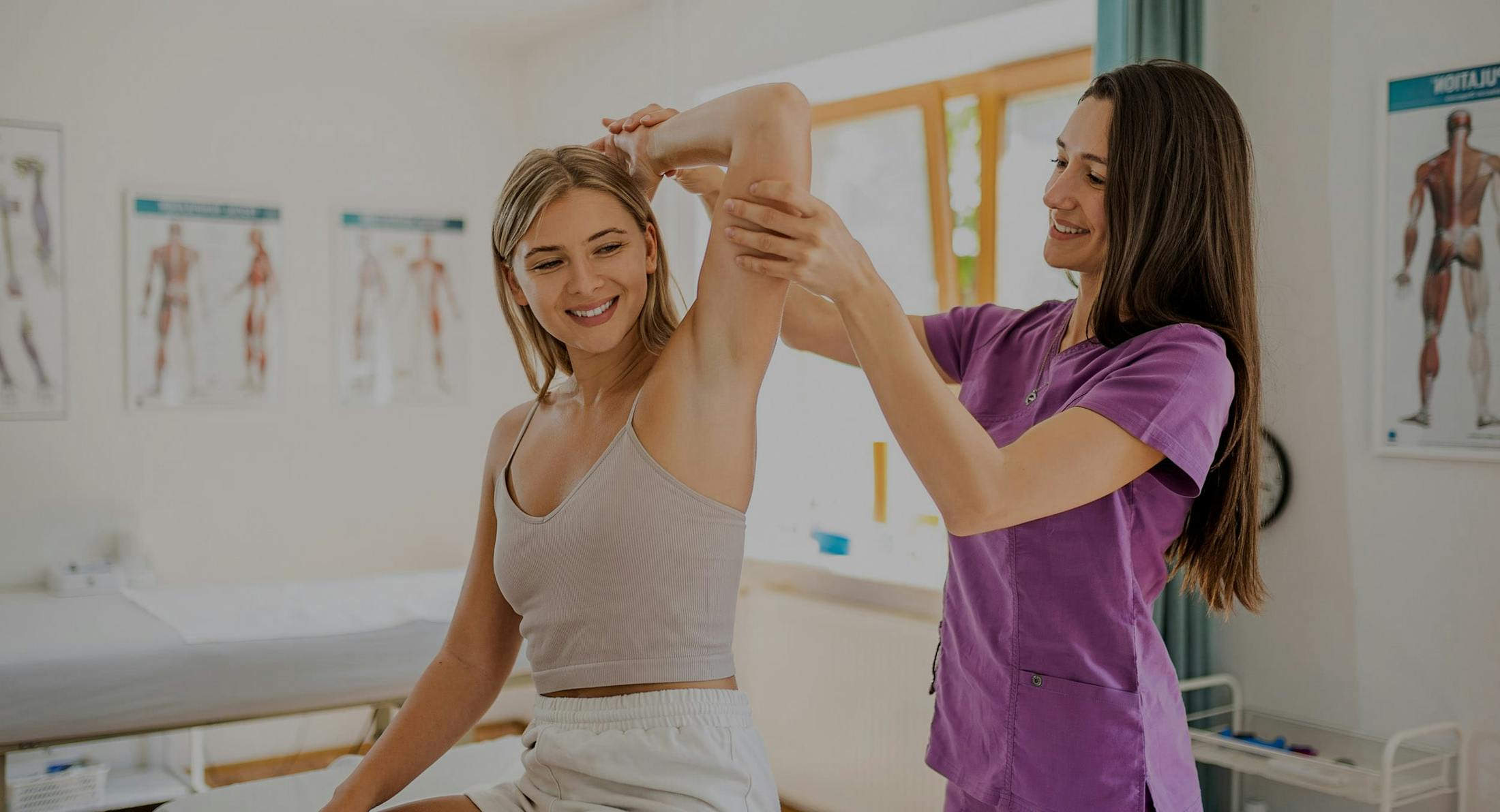Doctor examining patient's shoulder