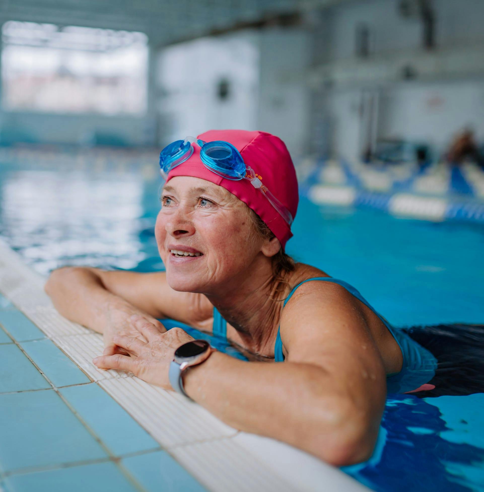 Woman smiling after swimming in pool
