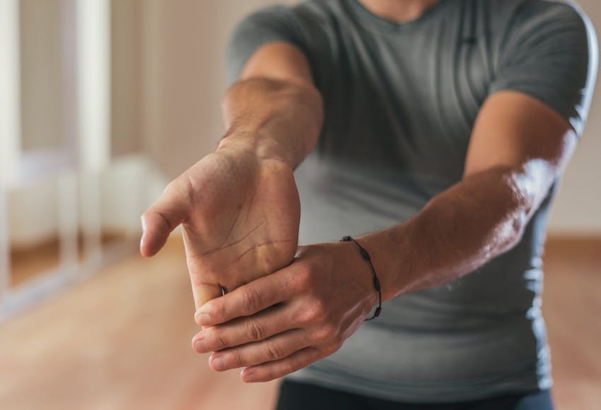 Man in Hand therapy