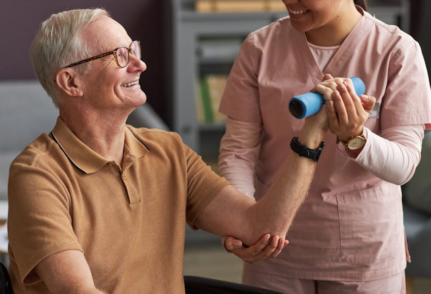 Man smiling with Doctor during exam