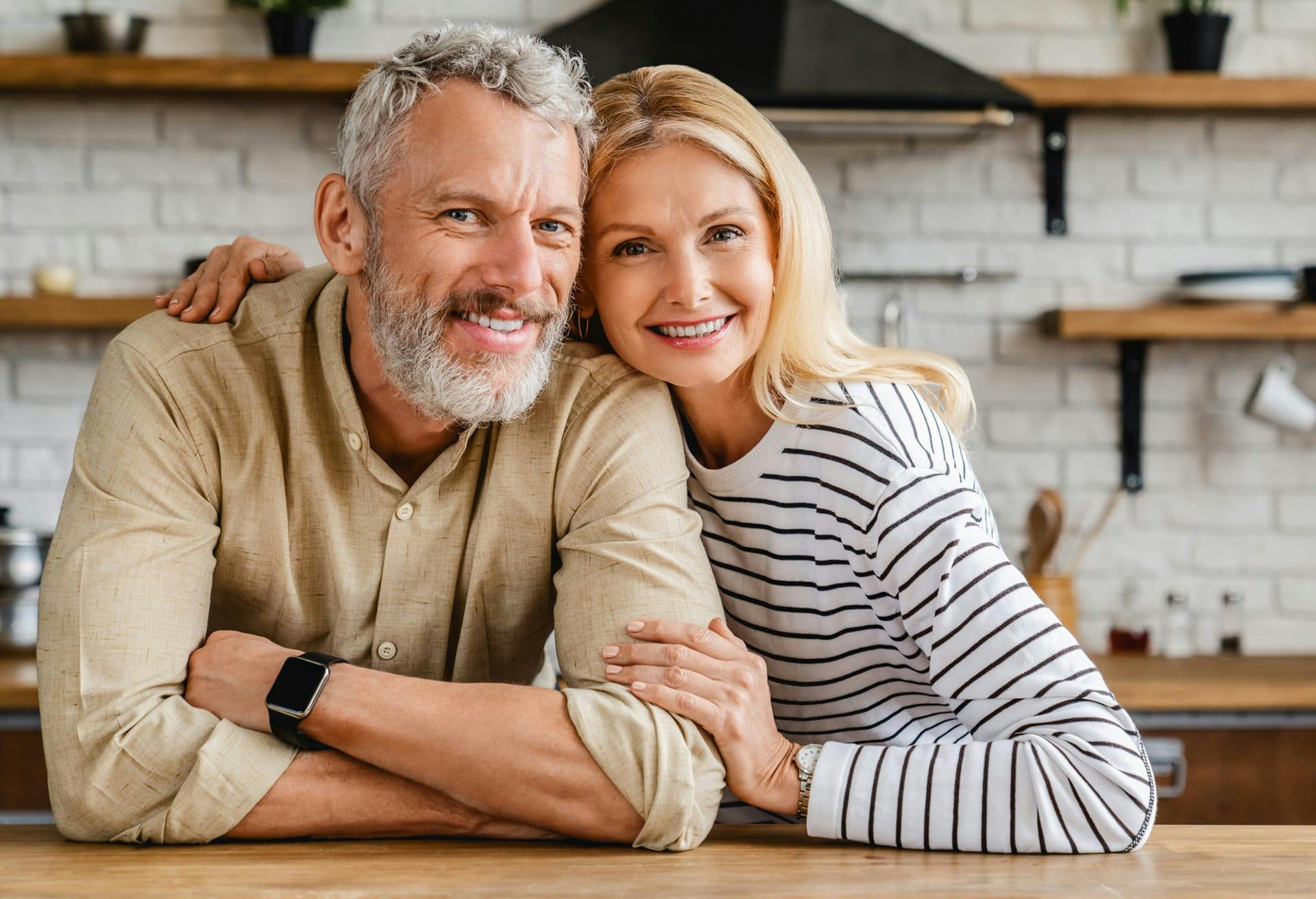 Smiling couple in kitchen