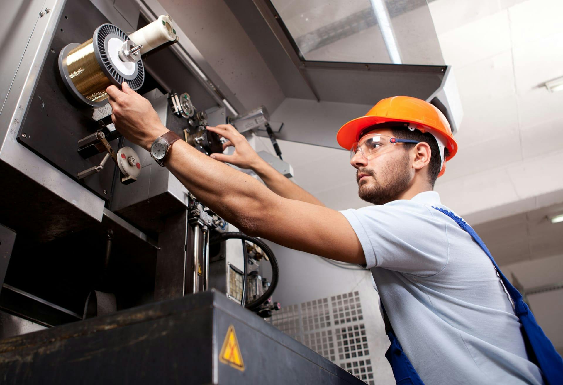 Man working on AC unit