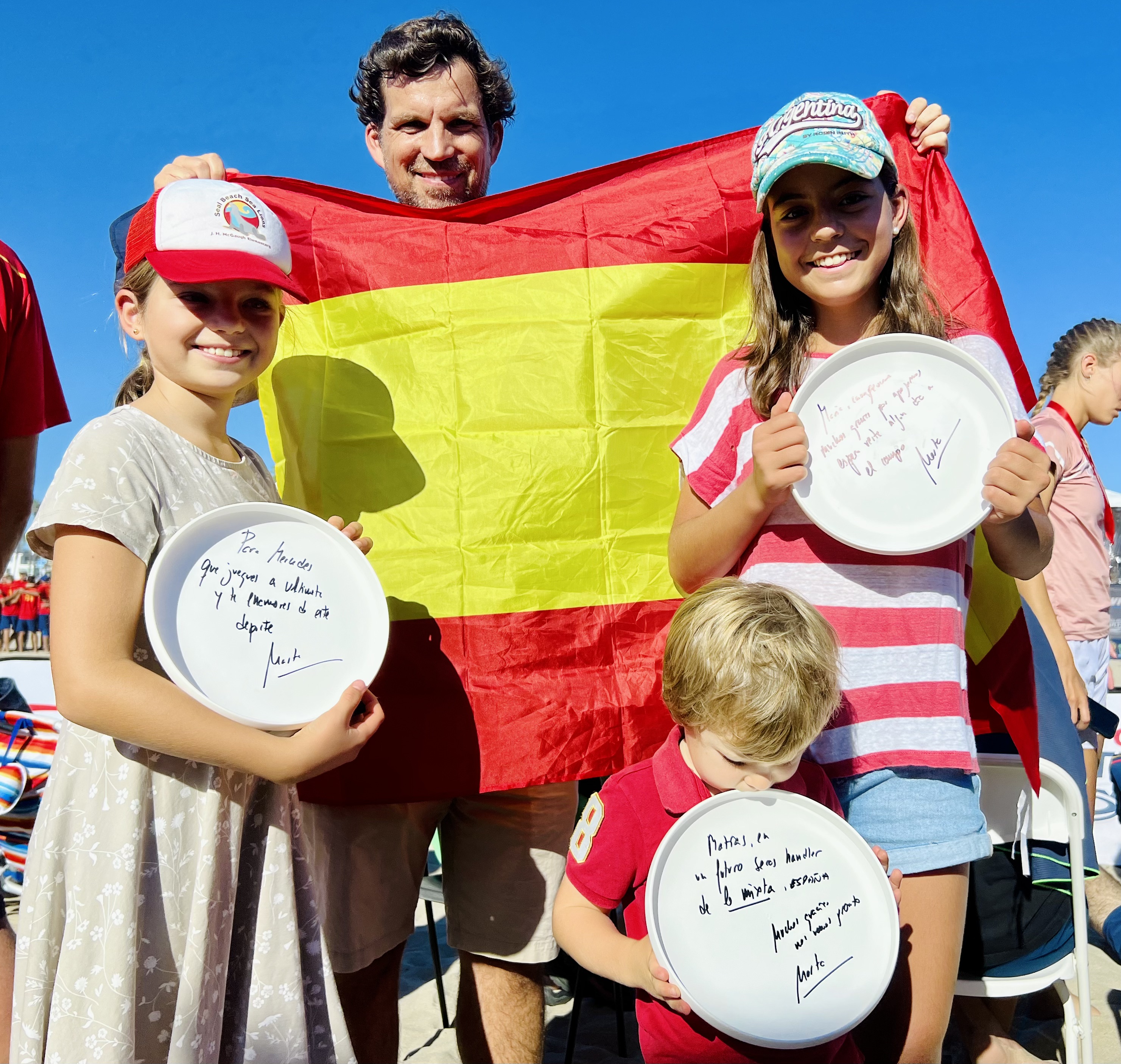 Img: boy, child, male, person, adult, man, hat, chair, plate, flag