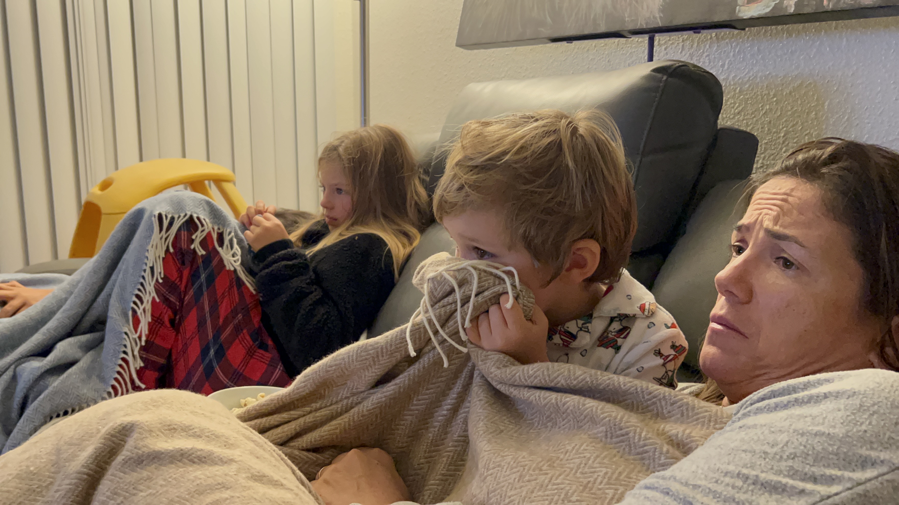 Img: couch, adult, female, person, woman, blanket, boy, child, male, girl