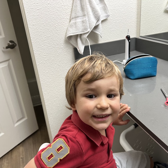 Img: face, person, photography, portrait, scissors, bag, handbag, door, indoors, furniture