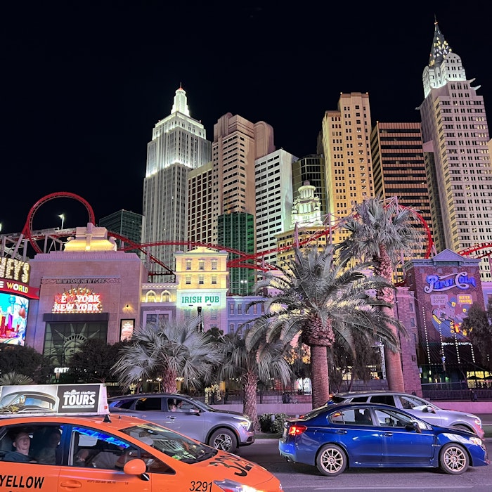 Img: city, metropolis, urban, office building, car, cityscape, person, tree, road, neighborhood