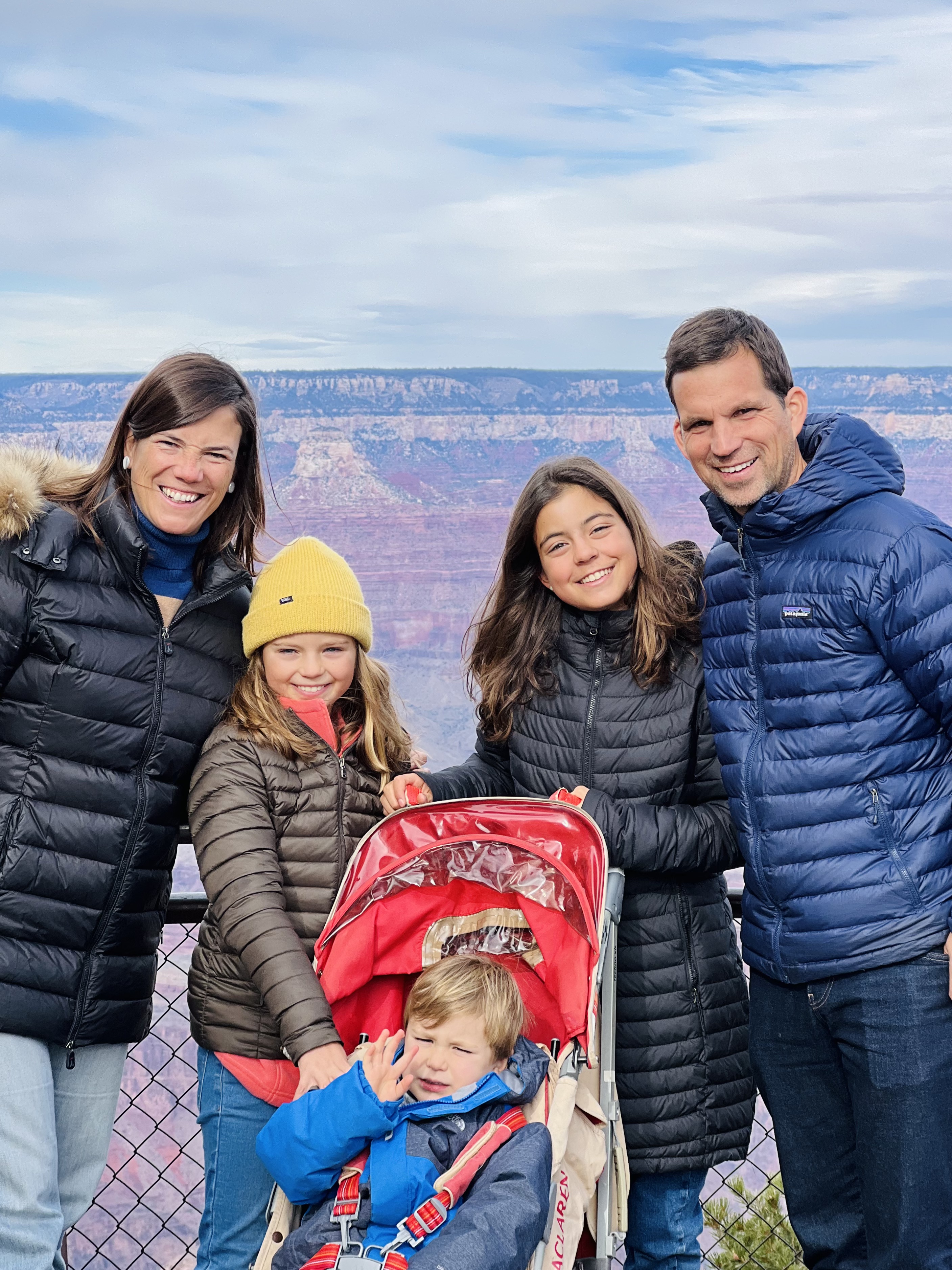 Img: pants, coat, jacket, person, smile, boy, child, male, adult, woman