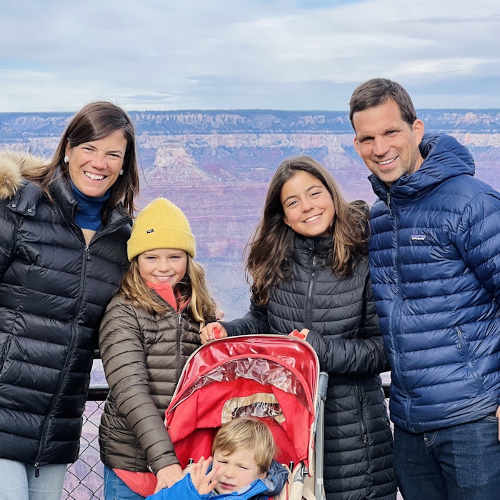 Img: pants, coat, jacket, person, smile, boy, child, male, adult, woman