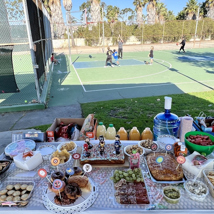 Img: brunch, person, people, box, volleyball (ball), bread, shoe, plate, basketball game, soccer ball