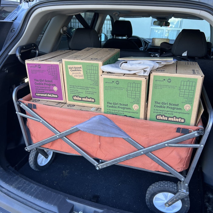 Img: chair, furniture, box, car, transportation, vehicle, car trunk, carton, wheel, package delivery