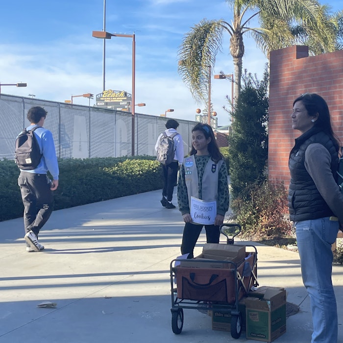Img: person, walking, backpack, pants, female, girl, teen, adult, woman, shoe