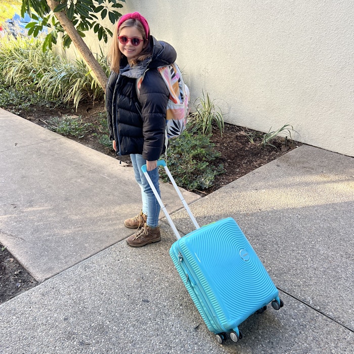 Img: baggage, person, clothing, coat