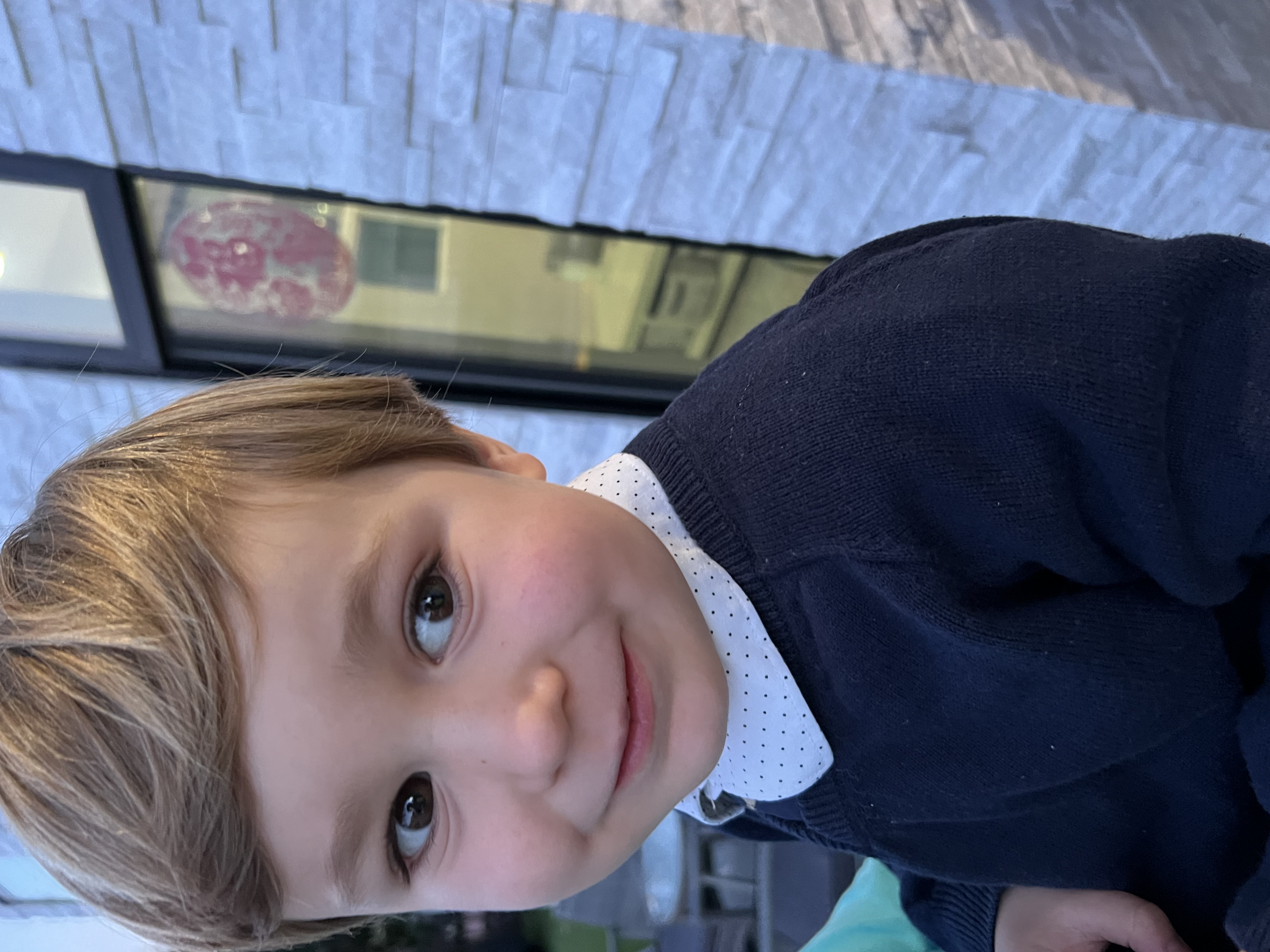 Img: face, head, person, photography, portrait, smile, long sleeve, coat, sweater, finger