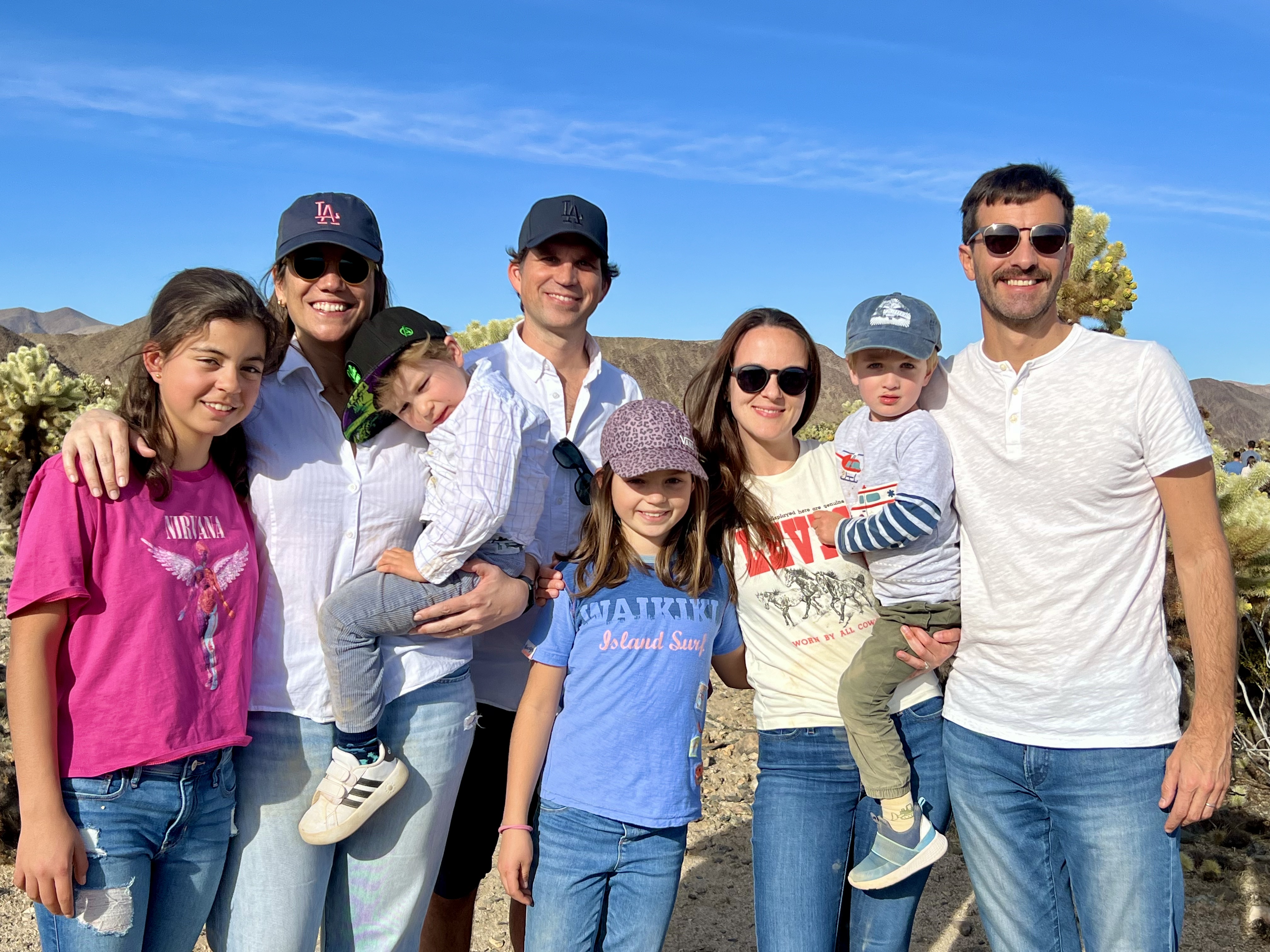 Img: pants, jeans, people, person, t-shirt, sunglasses, hat, baseball cap, adult, man