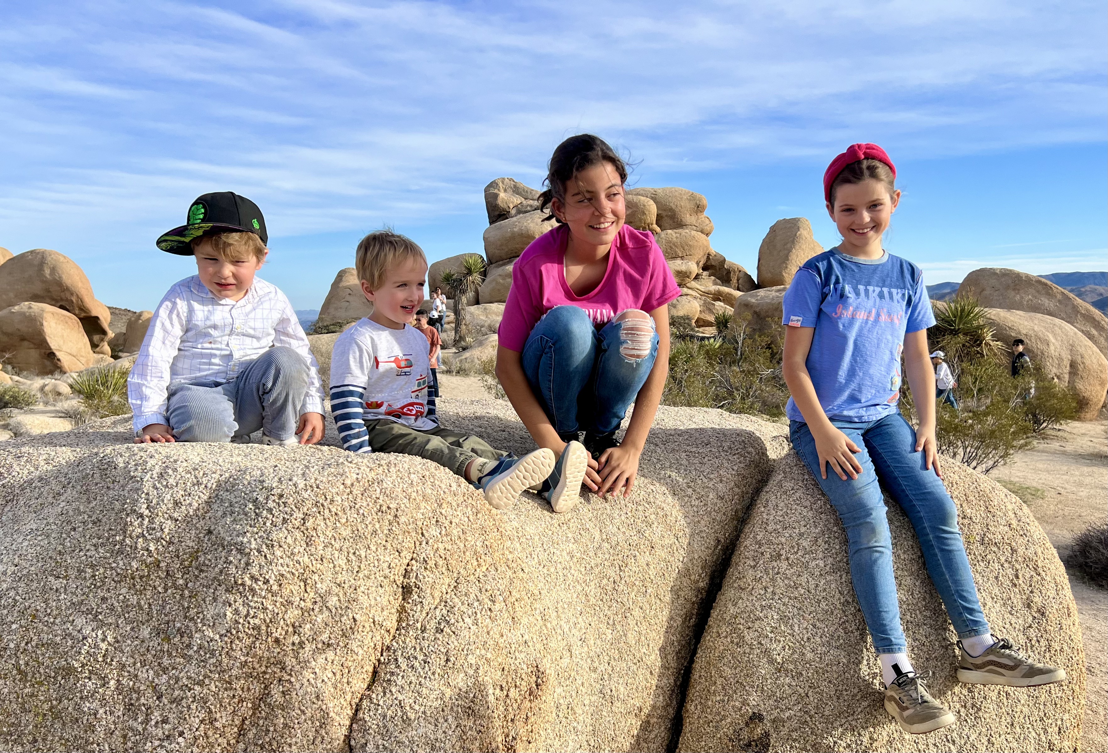 Img: rock, pants, person, boy, child, male, jeans, shoe, people, photography