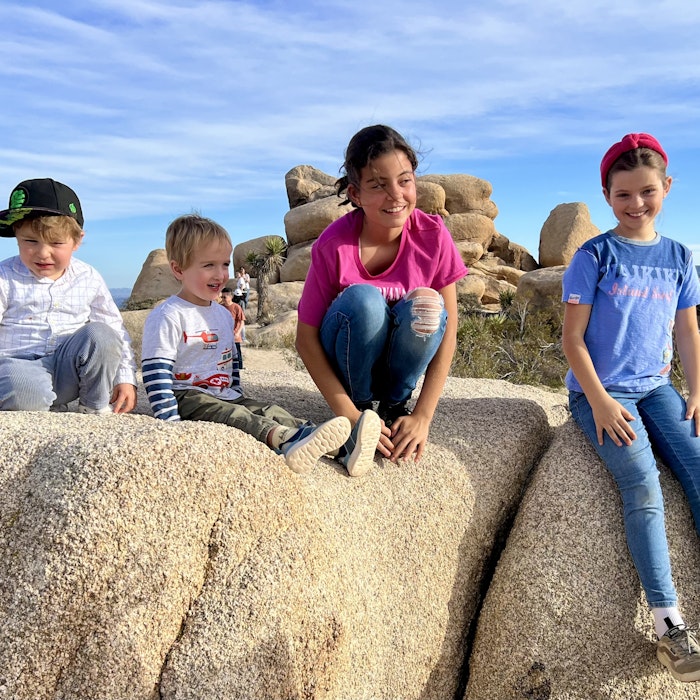 Img: rock, pants, person, boy, child, male, jeans, shoe, people, photography